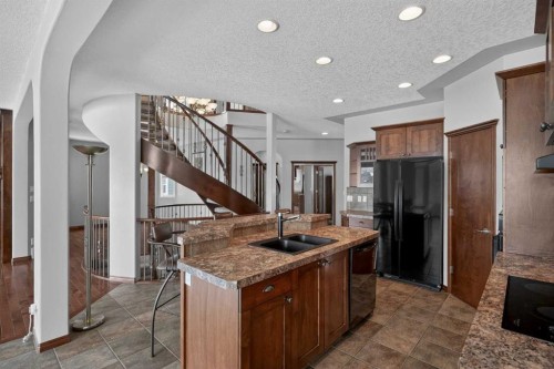 70 Panatella Circle Nw, Calgary, AB - Indoor Photo Showing Kitchen With Double Sink