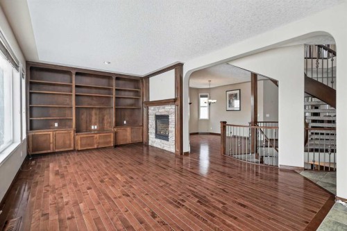 70 Panatella Circle Nw, Calgary, AB - Indoor With Fireplace