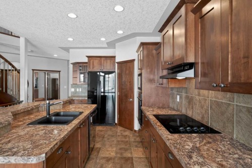70 Panatella Circle Nw, Calgary, AB - Indoor Photo Showing Kitchen With Double Sink With Upgraded Kitchen