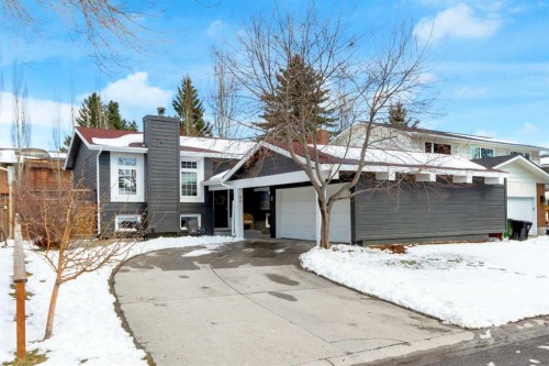 40 Deermont Road Se, Calgary, AB - Outdoor With Facade