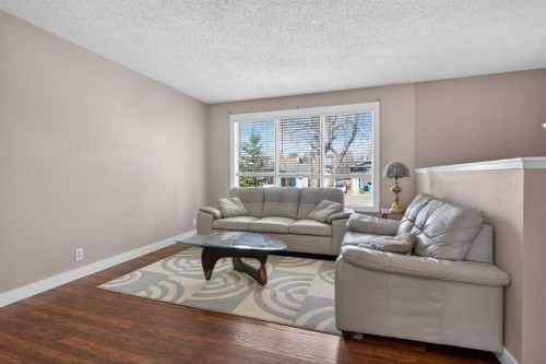 32 Fallingworth Court Ne, Calgary, AB - Indoor Photo Showing Living Room