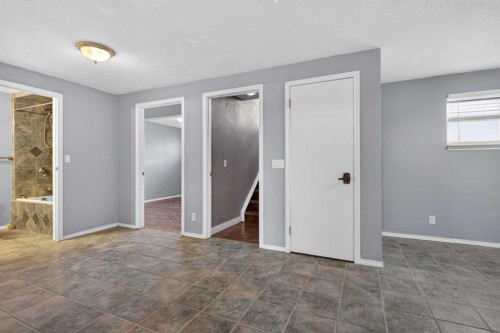 32 Fallingworth Court Ne, Calgary, AB - Indoor Photo Showing Other Room