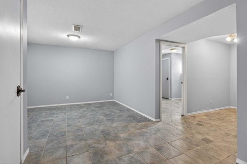 32 Fallingworth Court Ne, Calgary, AB - Indoor Photo Showing Other Room