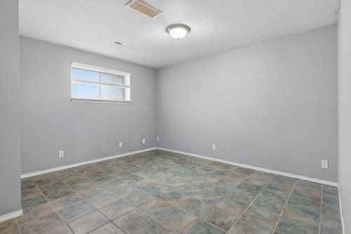32 Fallingworth Court Ne, Calgary, AB - Indoor Photo Showing Other Room