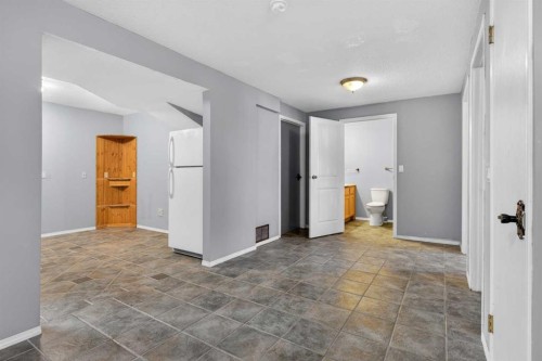 32 Fallingworth Court Ne, Calgary, AB - Indoor Photo Showing Other Room