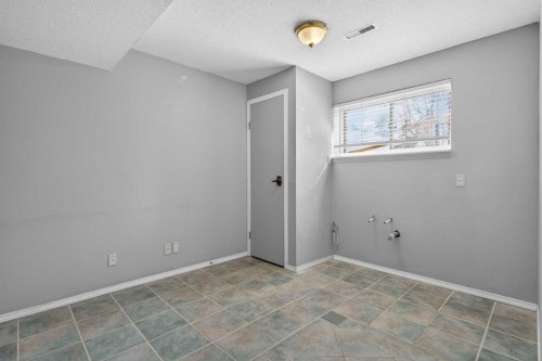 32 Fallingworth Court Ne, Calgary, AB - Indoor Photo Showing Other Room