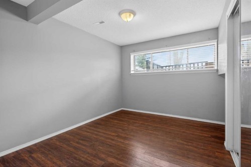 32 Fallingworth Court Ne, Calgary, AB - Indoor Photo Showing Other Room