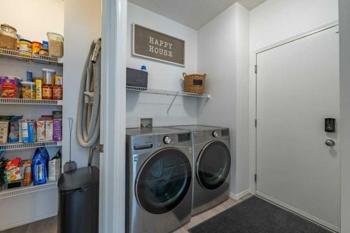 322 Rockyspring Circle Nw, Calgary, AB - Indoor Photo Showing Laundry Room