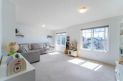 322 Rockyspring Circle Nw, Calgary, AB - Indoor Photo Showing Living Room