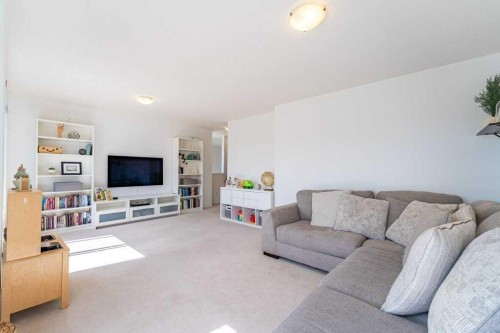 322 Rockyspring Circle Nw, Calgary, AB - Indoor Photo Showing Living Room