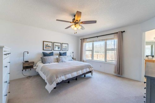 322 Rockyspring Circle Nw, Calgary, AB - Indoor Photo Showing Bedroom