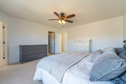 322 Rockyspring Circle Nw, Calgary, AB - Indoor Photo Showing Bedroom