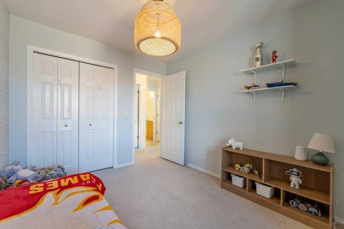 322 Rockyspring Circle Nw, Calgary, AB - Indoor Photo Showing Bedroom