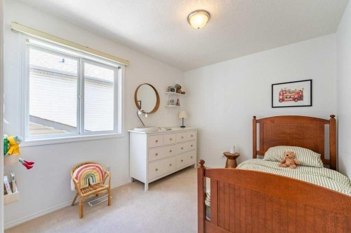 322 Rockyspring Circle Nw, Calgary, AB - Indoor Photo Showing Bedroom