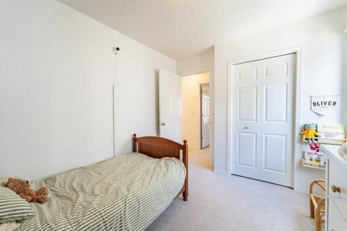 322 Rockyspring Circle Nw, Calgary, AB - Indoor Photo Showing Bedroom