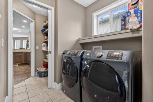 111 Valley Ponds Crescent Nw, Calgary, AB - Indoor Photo Showing Laundry Room