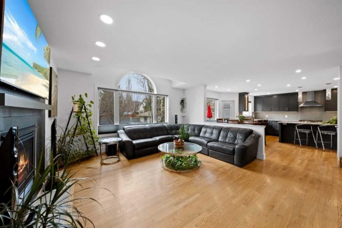 90 Riverview Circle Se, Calgary, AB - Indoor Photo Showing Living Room With Fireplace