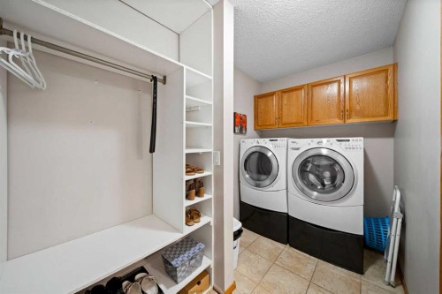90 Riverview Circle Se, Calgary, AB - Indoor Photo Showing Laundry Room