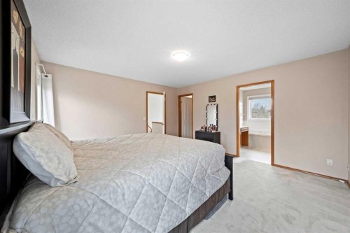 90 Riverview Circle Se, Calgary, AB - Indoor Photo Showing Bedroom