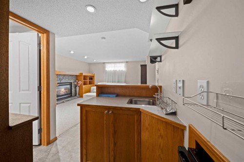 90 Riverview Circle Se, Calgary, AB - Indoor With Fireplace