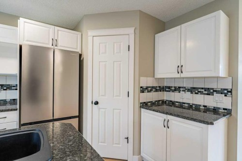 11 Saddlemont Close Ne, Calgary, AB - Indoor Photo Showing Kitchen
