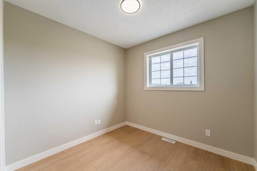 11 Saddlemont Close Ne, Calgary, AB - Indoor Photo Showing Other Room