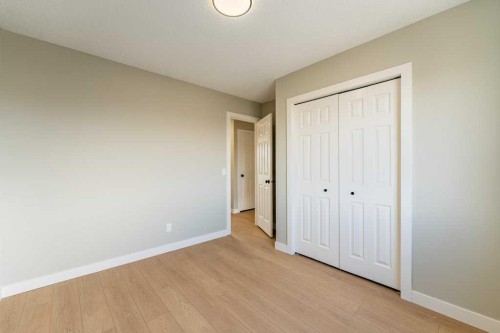 11 Saddlemont Close Ne, Calgary, AB - Indoor Photo Showing Other Room