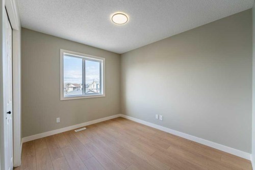 11 Saddlemont Close Ne, Calgary, AB - Indoor Photo Showing Other Room