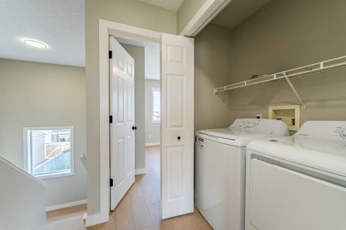 11 Saddlemont Close Ne, Calgary, AB - Indoor Photo Showing Laundry Room