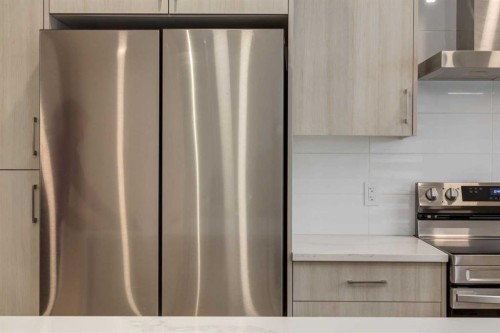 94-903 Mahogany Boulevard Se, Calgary, AB - Indoor Photo Showing Kitchen With Stainless Steel Kitchen