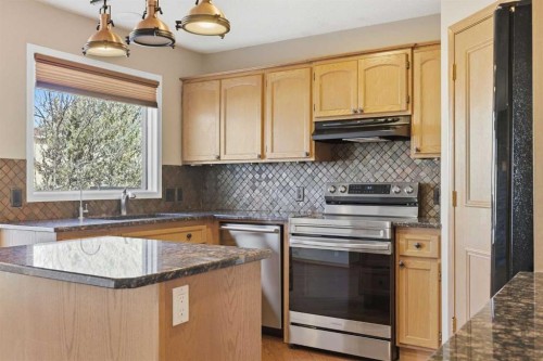 105 Crystalridge Drive, Okotoks, AB - Indoor Photo Showing Kitchen