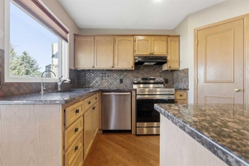 105 Crystalridge Drive, Okotoks, AB - Indoor Photo Showing Kitchen