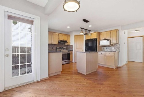 105 Crystalridge Drive, Okotoks, AB - Indoor Photo Showing Kitchen