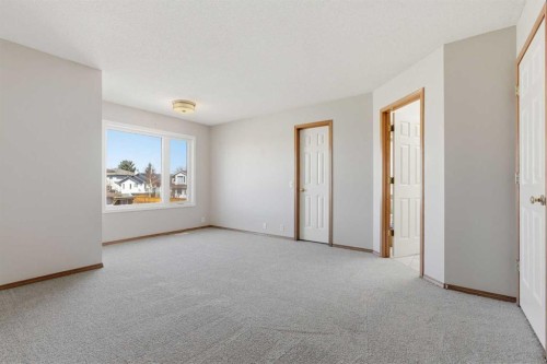 105 Crystalridge Drive, Okotoks, AB - Indoor Photo Showing Other Room