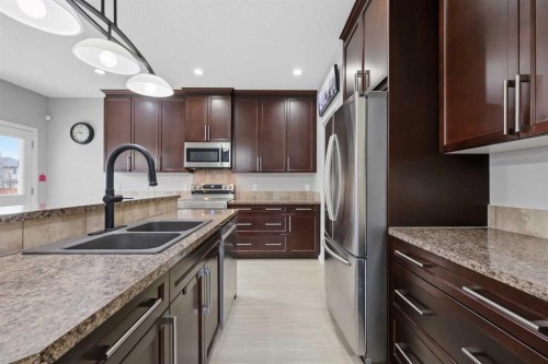 1198 Kingston Crescent Se, Airdrie, AB - Indoor Photo Showing Kitchen With Double Sink With Upgraded Kitchen