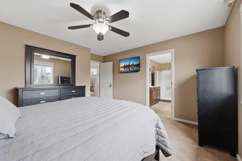 1198 Kingston Crescent Se, Airdrie, AB - Indoor Photo Showing Bedroom