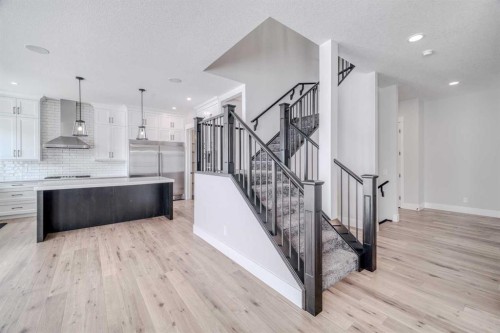 111 Aspen Summit Boulevard Sw, Calgary, AB - Indoor Photo Showing Kitchen With Upgraded Kitchen