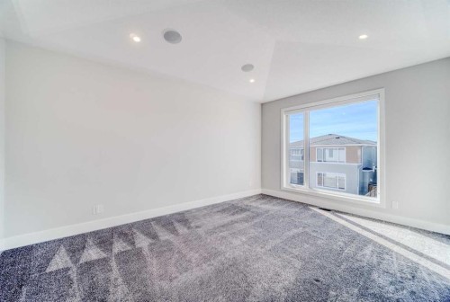 111 Aspen Summit Boulevard Sw, Calgary, AB - Indoor Photo Showing Other Room