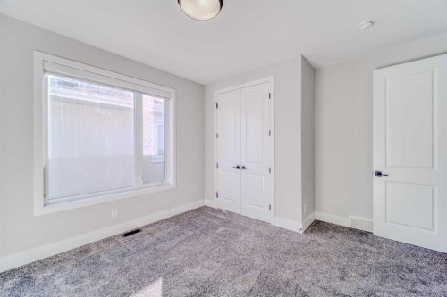 111 Aspen Summit Boulevard Sw, Calgary, AB - Indoor Photo Showing Other Room