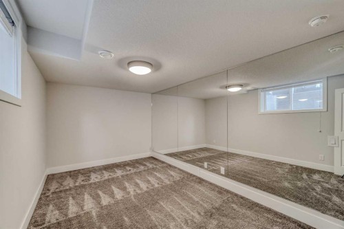 111 Aspen Summit Boulevard Sw, Calgary, AB - Indoor Photo Showing Other Room