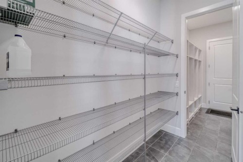 111 Aspen Summit Boulevard Sw, Calgary, AB - Indoor With Storage