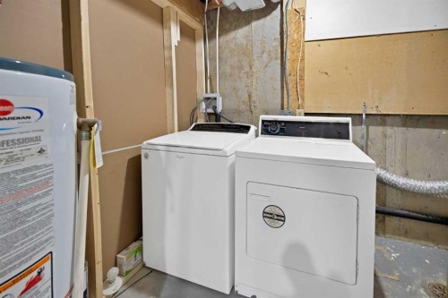 4351 38 Street Ne, Calgary, AB - Indoor Photo Showing Laundry Room