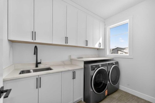 380 Watercrest Place, Chestermere, AB - Indoor Photo Showing Laundry Room