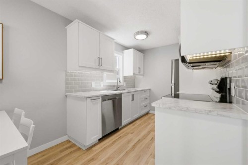 6 Mckernan Place Se, Calgary, AB - Indoor Photo Showing Kitchen