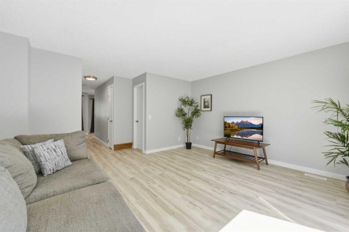 6 Mckernan Place Se, Calgary, AB - Indoor Photo Showing Living Room