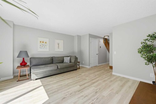 6 Mckernan Place Se, Calgary, AB - Indoor Photo Showing Living Room
