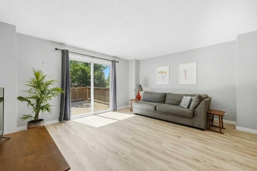 6 Mckernan Place Se, Calgary, AB - Indoor Photo Showing Living Room