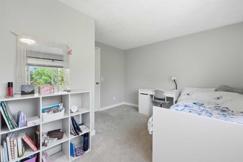 6 Mckernan Place Se, Calgary, AB - Indoor Photo Showing Bedroom