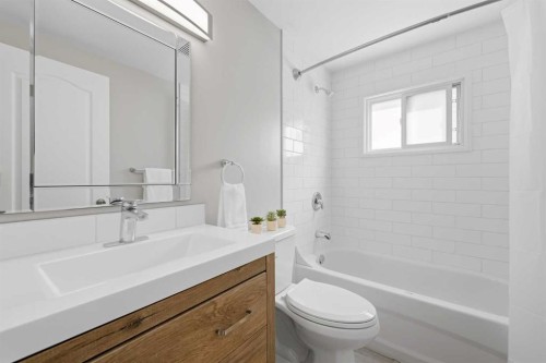 6 Mckernan Place Se, Calgary, AB - Indoor Photo Showing Bathroom