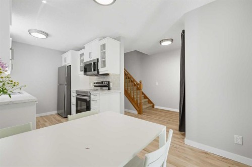 6 Mckernan Place Se, Calgary, AB - Indoor Photo Showing Kitchen